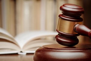 a gavel in a wrongful death courtroom 